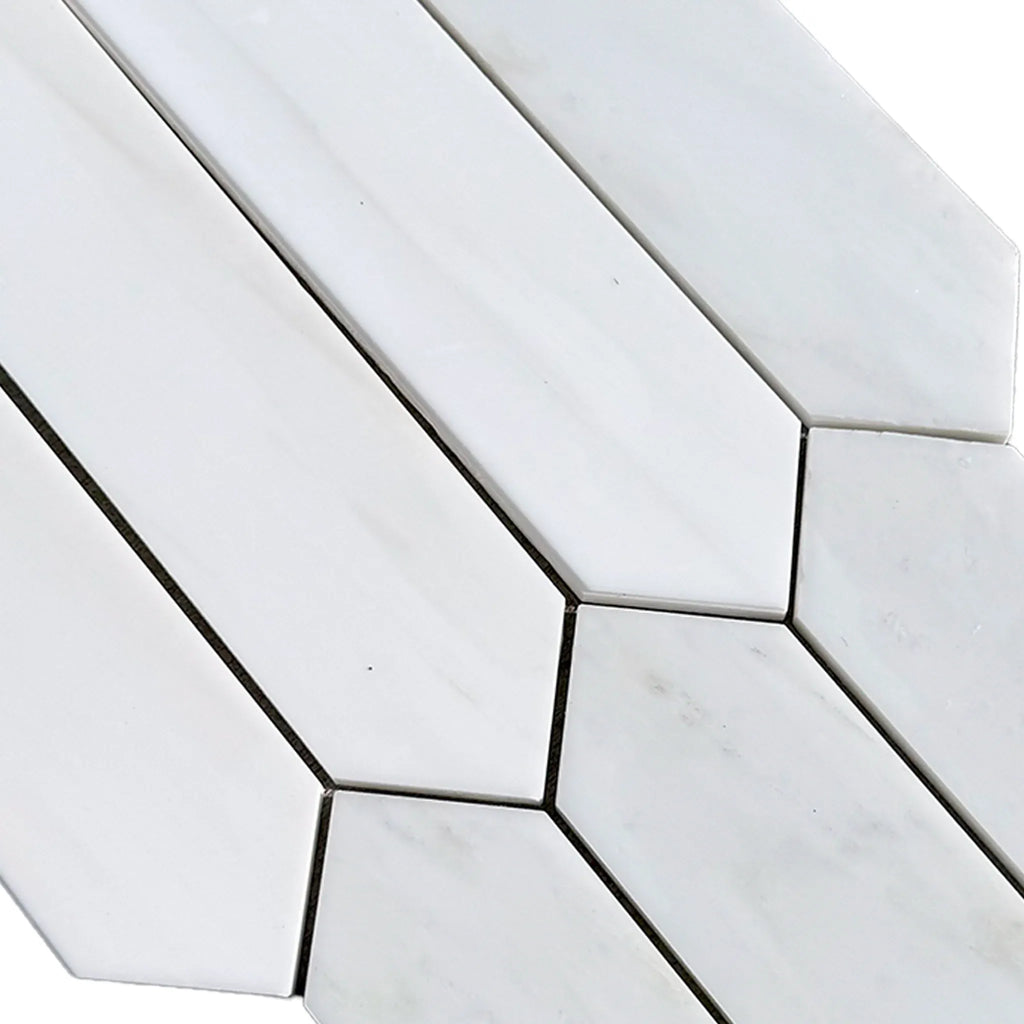White elongated hexagon tiles in Bianco Dolomite Marble 3 X 12 Picket Mosaic