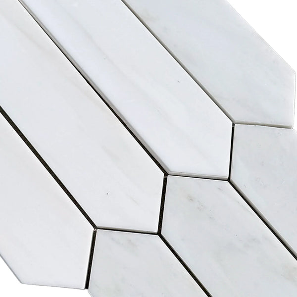White elongated hexagon tiles in Bianco Dolomite Marble 3 X 12 Picket Mosaic