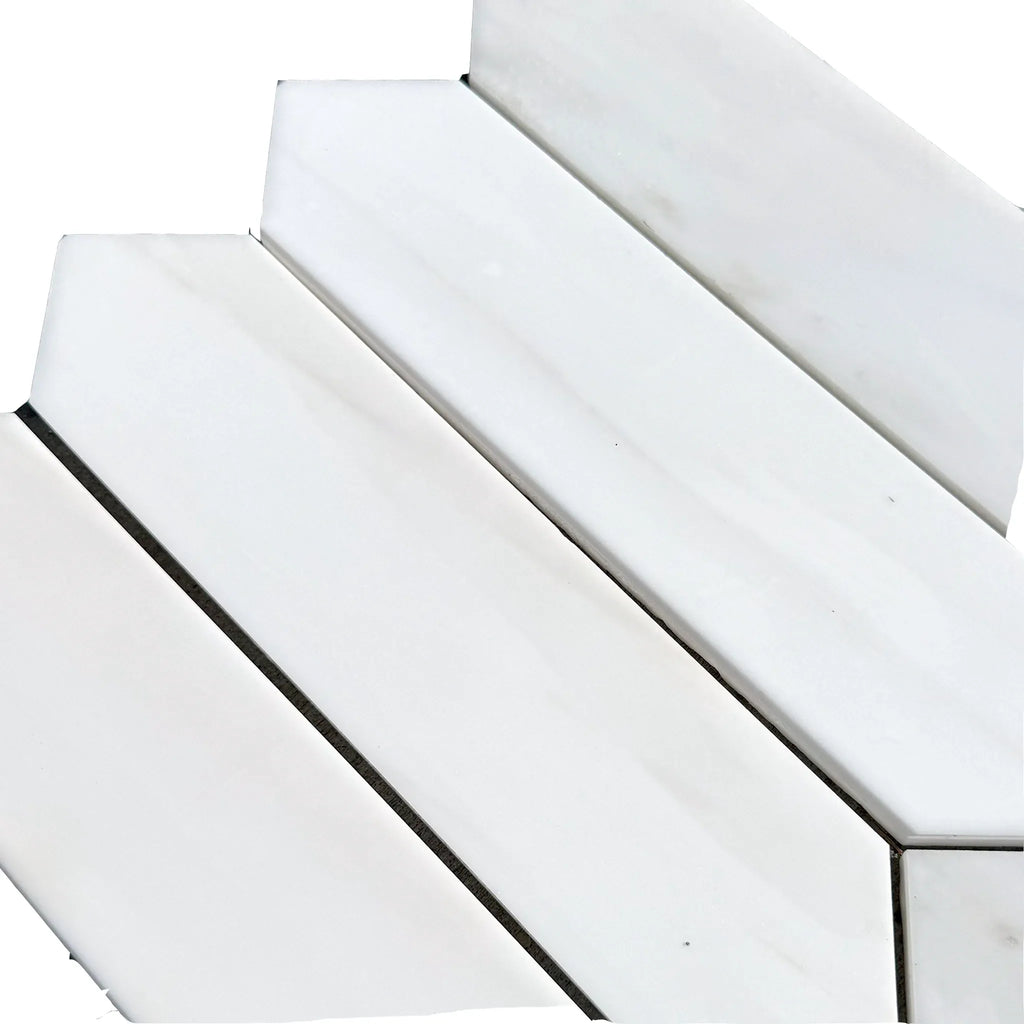 White elongated hexagon tiles in Bianco Dolomite Marble 3’’ X 12’’ Picket Mosaic