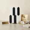 Bianco white dolomite and nero marquina marble 3 by 12 inch picket mosaic tiles in black and white geometric pattern