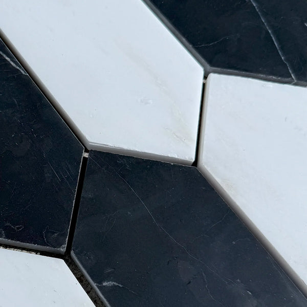 Black and white hexagon tiles in Bianco Dolomite and Nero Marquina Marble mosaic design