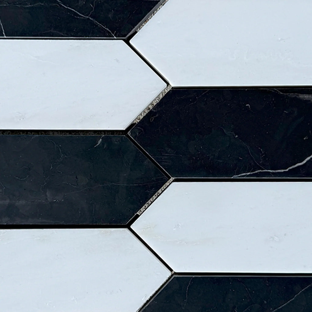 Black and white geometric tile pattern featuring Bianco Dolomite and Nero Marquina Marble