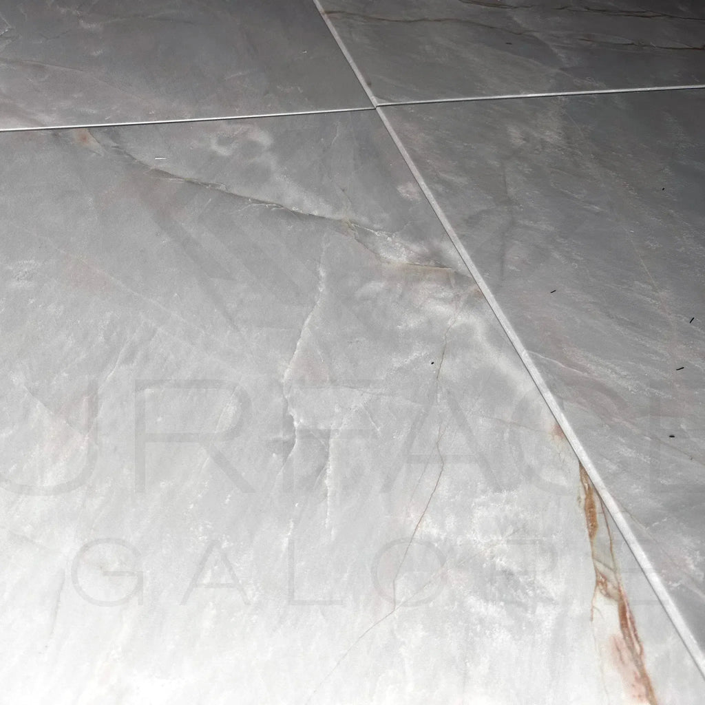 Gray marble floor tiles featuring Blue Jade Marble Polished Tile 18X18 at $9.14/Sq.Ft