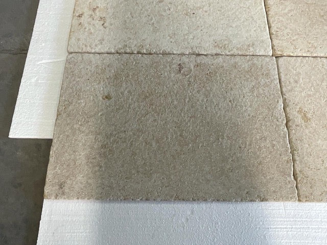 Bordeaux Rustique 16x24 limestone aged beige stone tiles with textured surface