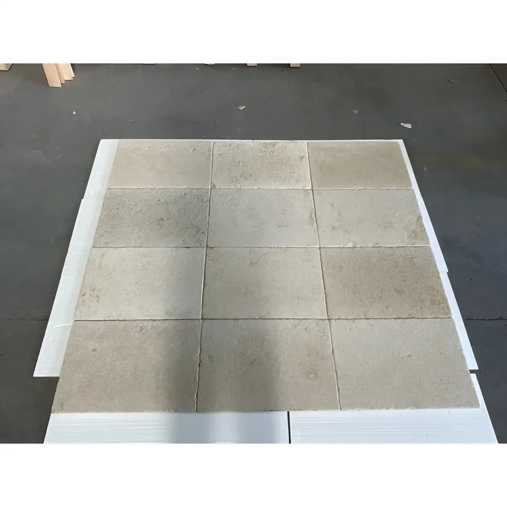 Bordeaux Rustique 16x24 reclaimed limestone tiles, beige with natural veining, matte grid