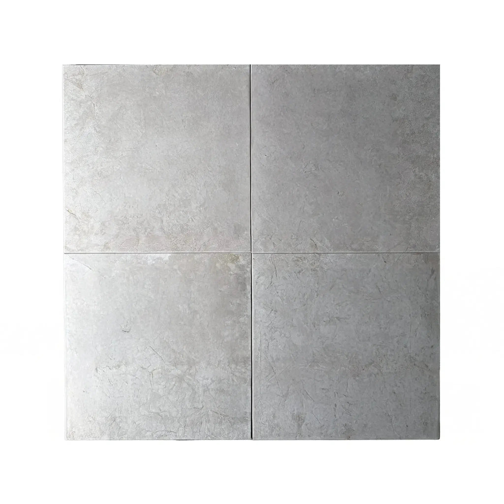 Four gray square tiles of Botticino Cream White Beige Marble Polished Tile 12X12