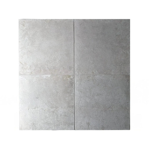Four gray square tiles of Botticino Cream White Beige Marble Polished Tile 12X12