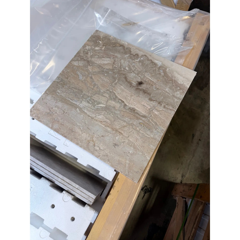 Beige breccia oniciata italian marble tile 12x12 with natural veining and a polished honed finish