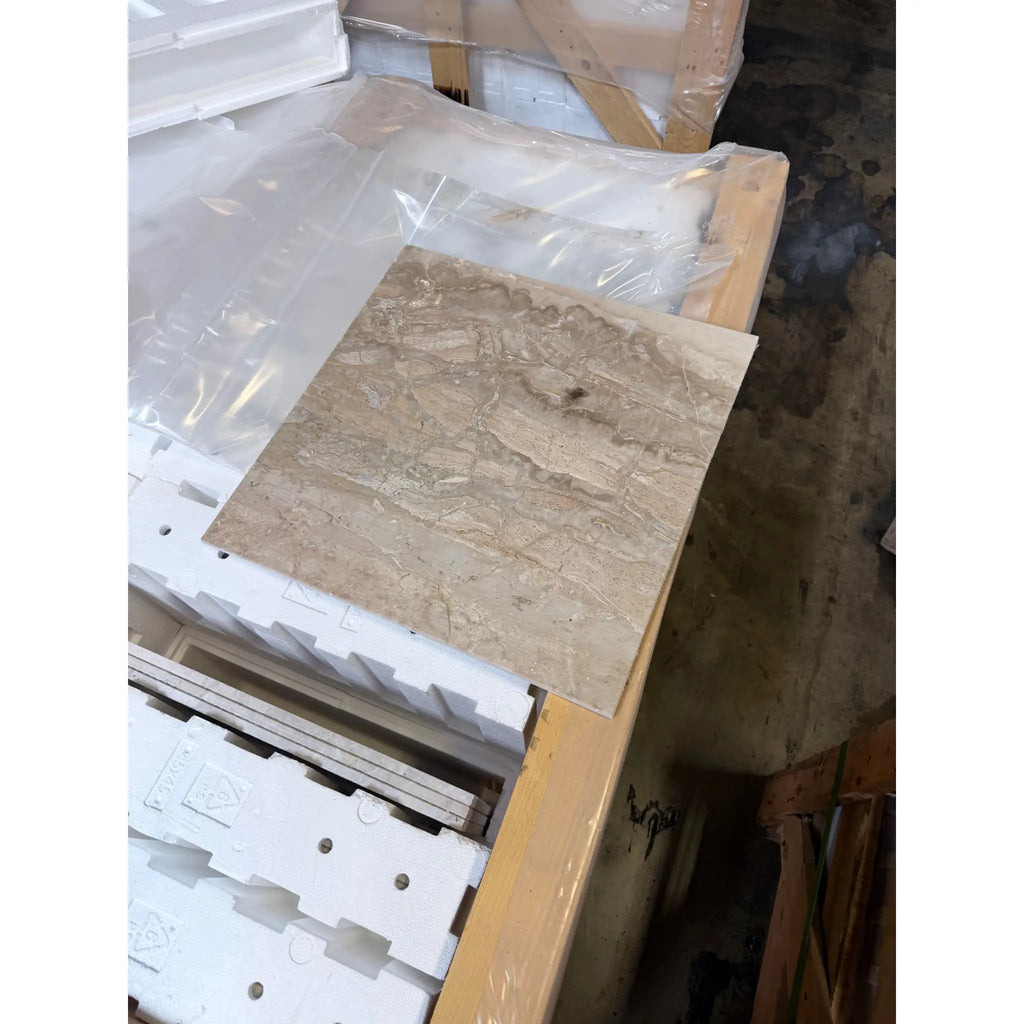 Beige breccia oniciata italian marble tile with natural veining and a smooth polished honed 12x12 surface