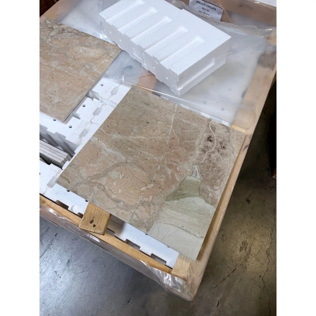 Beige breccia oniciata Italian marble tile with natural veining and polished reflective honed polished surface 12x12