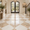 The floor features polished checkered white and beige breccia oniciata italian marble 12x12 honed polished tiles