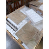 Beige breccia oniciata italian marble tiles with natural veining and polished finish in protective foam packaging