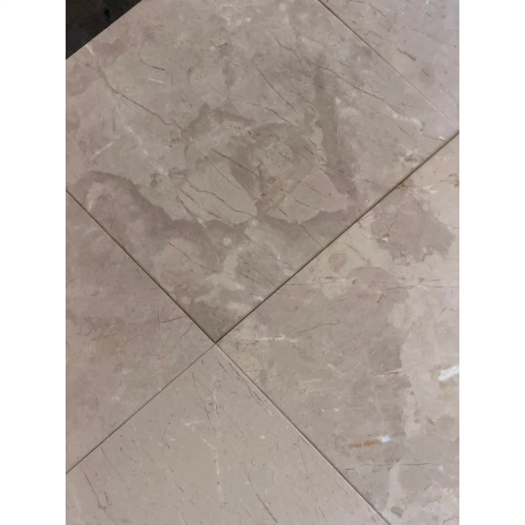 Bursa Beige Marble 12x12 Polished-Honed tiles with subtle gray and cream veining