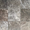 Nine gray marble tiles of Cafe Emperador 12X12 Polished Tile displayed for sale
