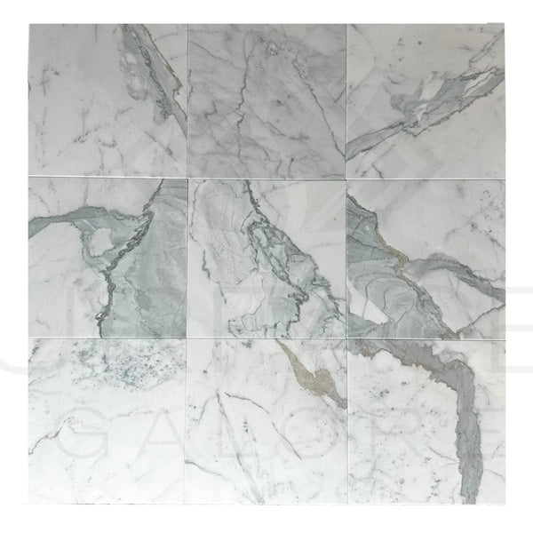 Nine Calacatta Bettogli polished marble tiles showing elegant marble patterns