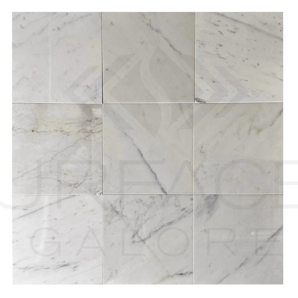 Nine Calacatta Carrara 12X12 Polished Marble Tiles displayed for sale