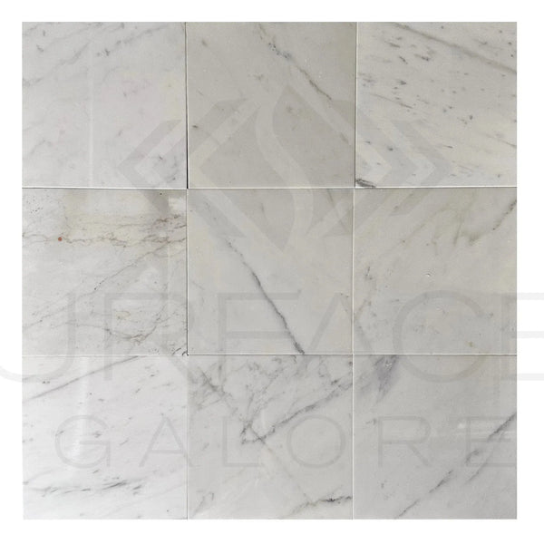 Nine Calacatta Carrara 12X12 Polished Marble Tiles displayed for sale