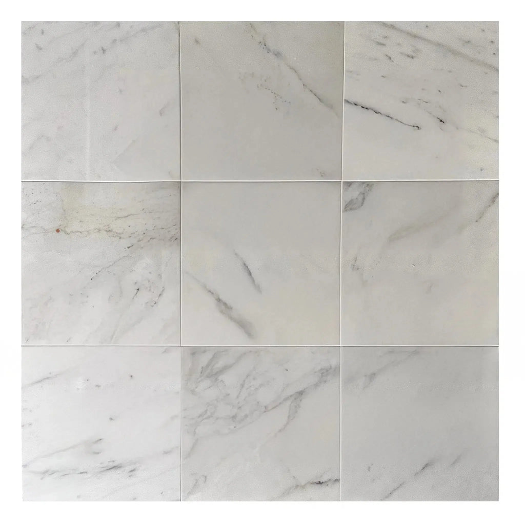 Nine square Calacatta Carrara polished marble tiles in a 300 sq. ft. product display