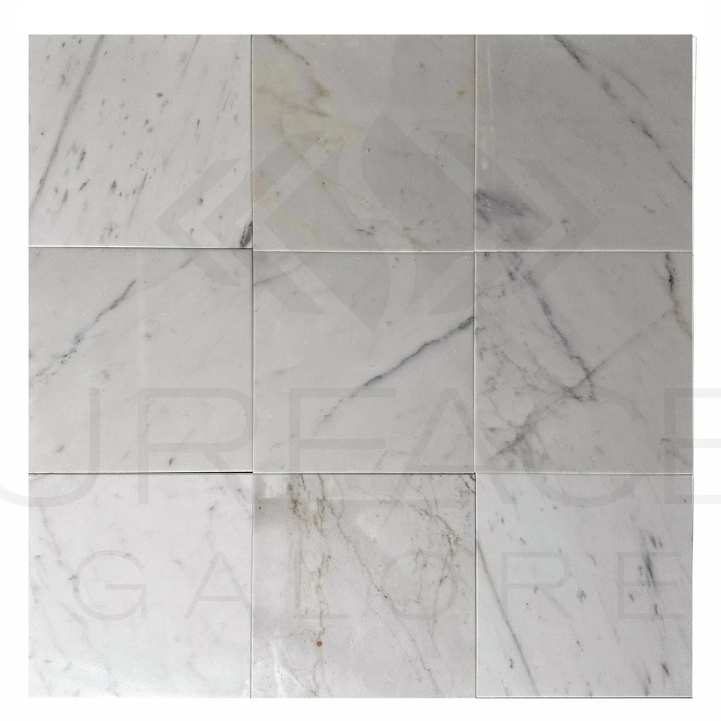 Nine Calacatta Carrara Polished Marble Tiles displayed for sale at $6.96/Sq.Ft