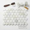 Calacatta gold 1 inch hexagon mosaic marble tile polished white with subtle veining and a sleek finish