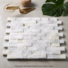 White calacatta gold 1x2 brick split-faced mosaic marble tile with subtle veining in offset brick layout