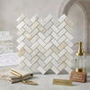 White italian calacatta gold 1x2 polished or honed marble mosaic tile with subtle veining in herringbone pattern