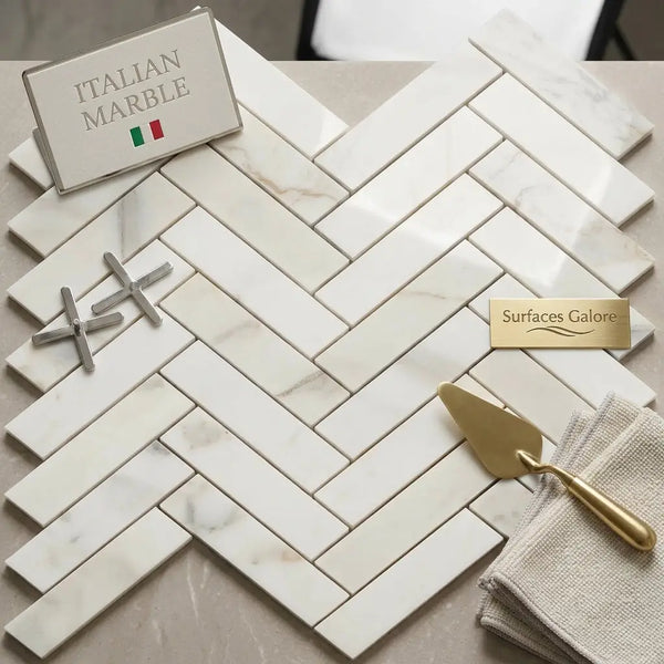 White italian marble calacatta gold 1x4 polished herringbone mosaic tile with subtle veining pattern