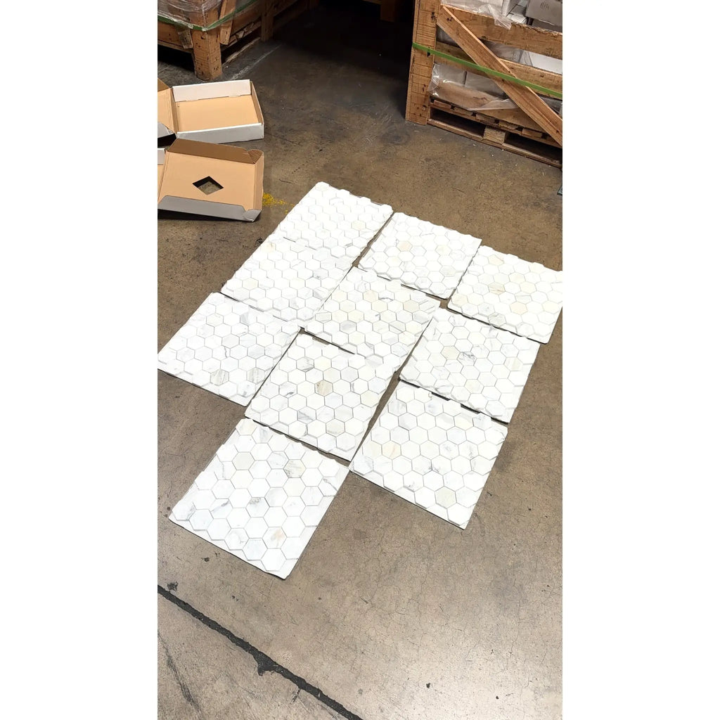 Calacatta gold 2 inch hexagon mosaic marble tile polished with white hexagonal tiles and subtle veining