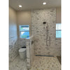 White marble subway tile shower wall with gray veining and matching calacatta gold 2 inch hexagon mosaic marble floor tiles polished or honed