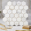 White 2 inch hexagonal calacatta gold italian marble mosaic tile with polished finish and gold toned grout