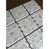 White hexagonal calacatta gold marble mosaic tile with subtle gray veining polished or honed finish