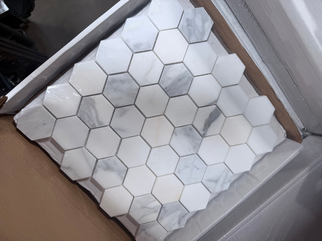 Calacatta Gold 2-inch white hexagon marble mosaic tile with gray veining