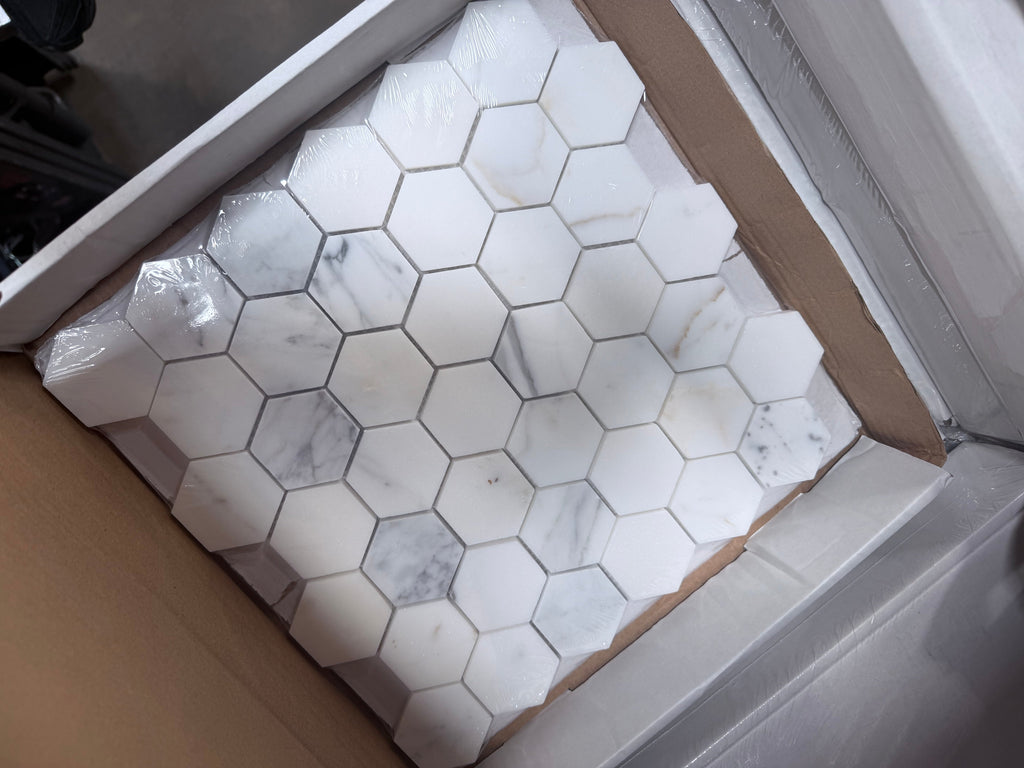 Calacatta Gold 2-inch white hexagon marble mosaic tile with gray veining