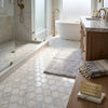 Calacatta gold 2 inch vortex hexagon mosaic marble tile with luxurious white base and subtle gray veining in polished or honed finish