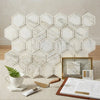 Calacatta Gold 2 inch vortex hexagon white marble mosaic tile with subtle gray veining and raised geometric edges