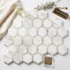 Calacatta gold 2 inch vortex hexagon mosaic marble tile with white hexagonal tiles gray veining and thin gold border