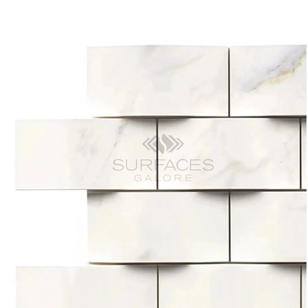 Calacatta Gold 2X4 Round-Faced Mosaic Marble Tile in polished finish showcasing white marble