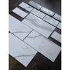 Calacatta Gold white marble-effect baseboard trim with gray veining