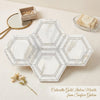 White calacatta gold italian marble hexagonal tray with subtle veining and black grid pattern polished mosaic tile