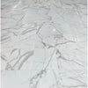 Calacatta Gold 5 Inch Hexagon Mosaic Marble Tile on a white marble tile floor