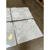 White hexagon mosaic marble tile with subtle gray veining in calacatta gold polished or honed finish arranged geometrically