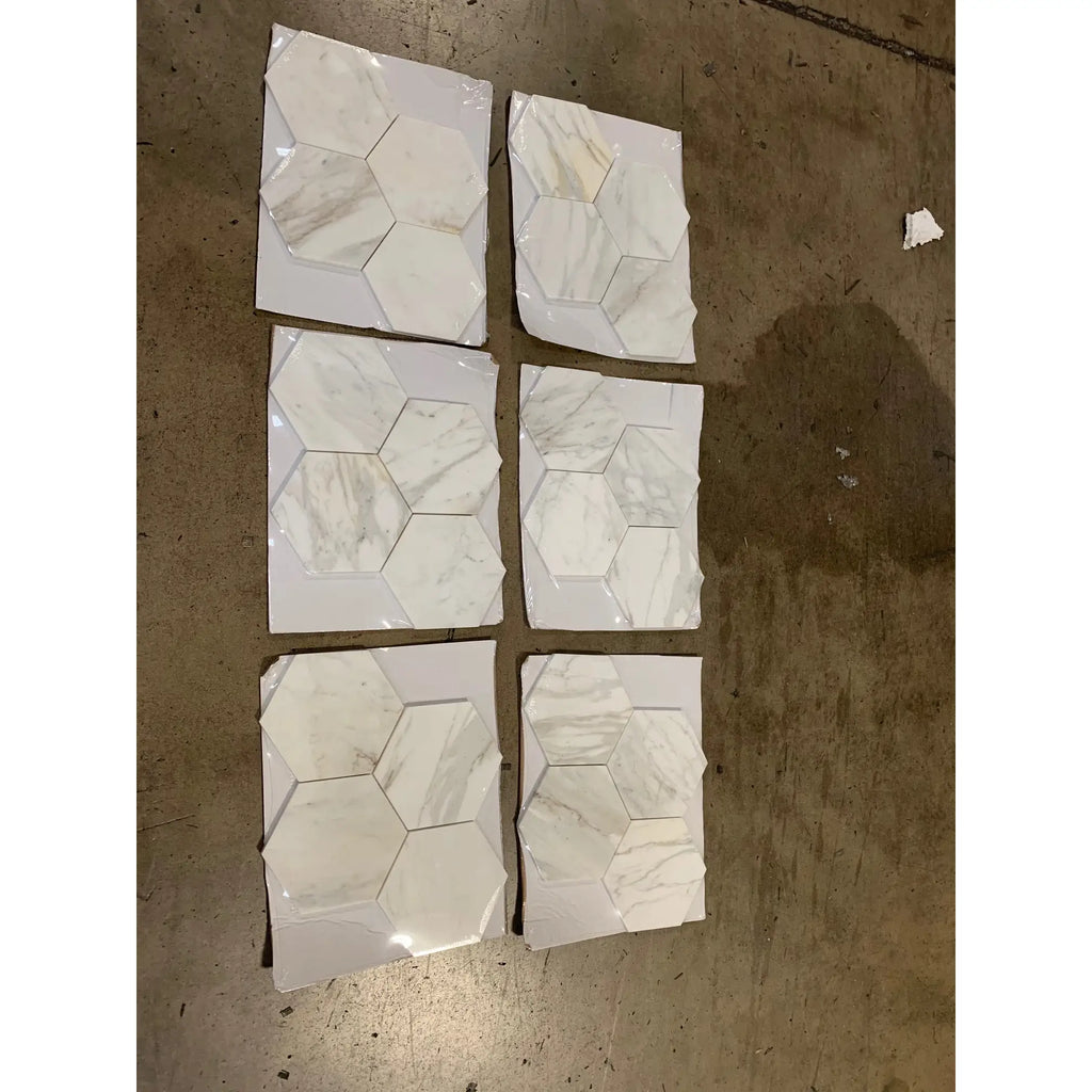 Calacatta gold 6 inch hexagon mosaic marble tile panel in white with subtle veining polished or honed finish