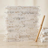 Luxury calacatta gold italian marble bamboo sticks mosaic tile in a sleek stacked brick pattern with elegant veining