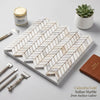Calacatta gold chevron mini mosaic marble tile polished with sleek herringbone pattern and creamy white subtle veining