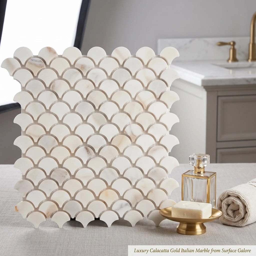 Calacatta gold fan raindrop mosaic marble tile with white and gold veined italian marble in a polished scalloped design