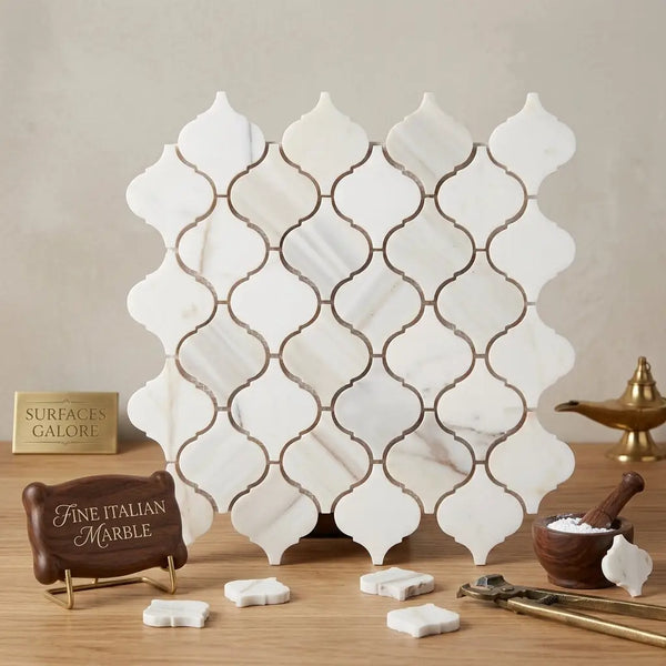 White marble quatrefoil mosaic tile with subtle veining and dark grout calacatta gold lantern polished or honed