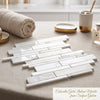 White calacatta gold italian marble tiles with subtle veining in a modern stacked pattern for flooring or walls