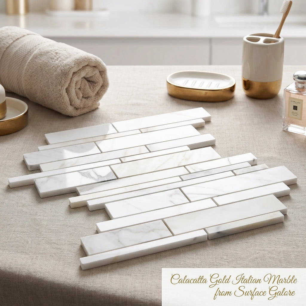 White calacatta gold italian marble tiles with subtle veining in a modern stacked pattern for flooring or walls