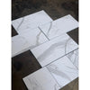 Calacatta Gold marble 12x12 polished tiles with white base and gray veining