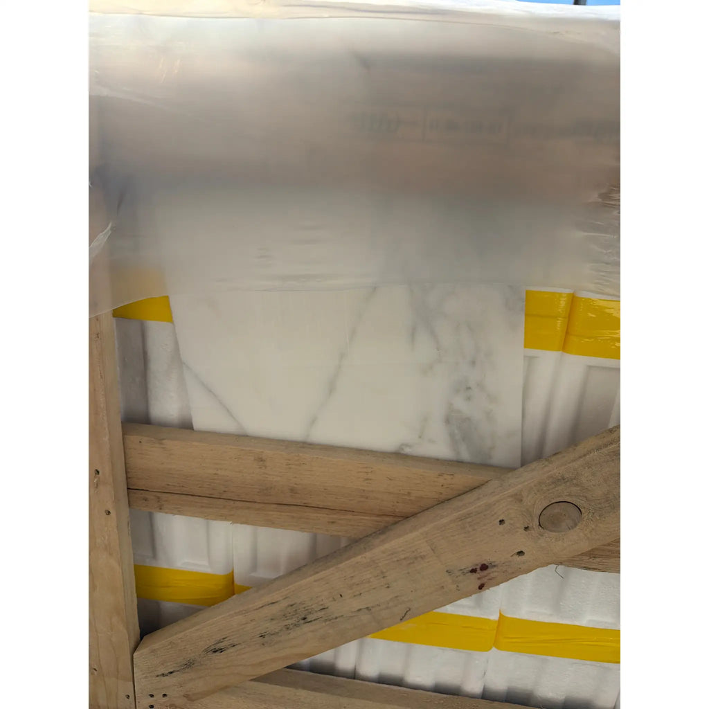 Calacatta Gold Marble 12x12 Polished slab with gray veining, plastic-wrapped